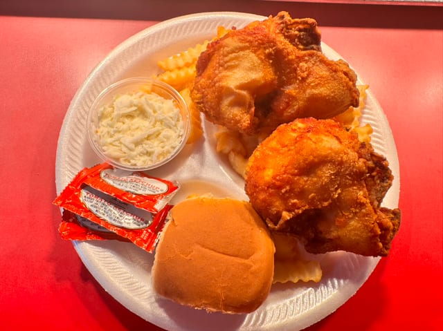 2 PC Breast Dinner Includes Fries,Slaw & Roll.