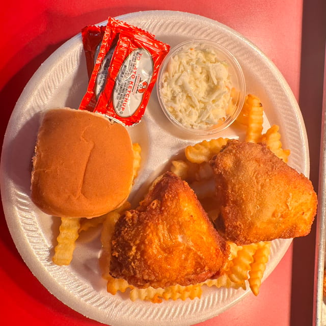 2 PC Thigh Dinner Includes Fries,Slaw & Roll.