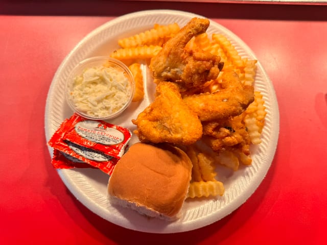 2 PC Whole Wing Dinner Includes Fries, Slaw & Roll.